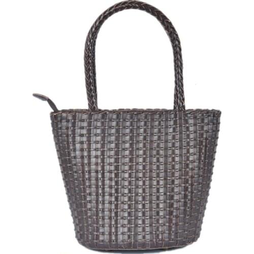 2021 spring and summer retro new leather hand-woven bag Japanese bucket bag Brown black and white color single shoulder handbag