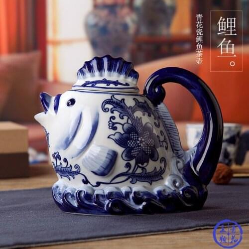 Jingdezhen ceramics blue and white carp teapot ornaments Chinese classical art home decoration ceramic fish tea pot