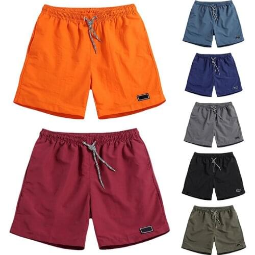 Men Casual Breathable Quick Dry Pants Pockets Beach Solid Color Sport Shorts