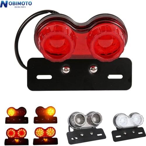 Universal Motorbike LED Twin Dual Tail Turn Signal Brake License Plate Integrated Light Fit For Bobber Cafe Racer ATV Chopper
