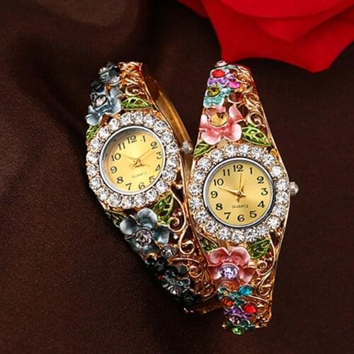 2018 Popular Brand Luxury Women\s Beautiful Flower Band Hollow Out Bangle Crystal Quartz Bracelet Watch Jewelry