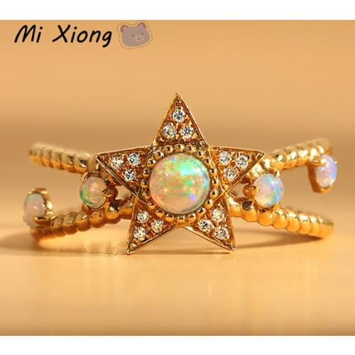 Mi Xiong s925 sterling silver opal gemstone designer craft star winding ring ladies light luxury fresh charm brand jewelry