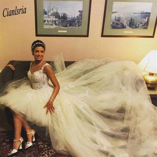 Gorgeous Spaghetti Straps Backless High/Low Wedding Dress Sweetheart Appliques Lace Pearls Dubai Arabic Bridal Wedding Dresses