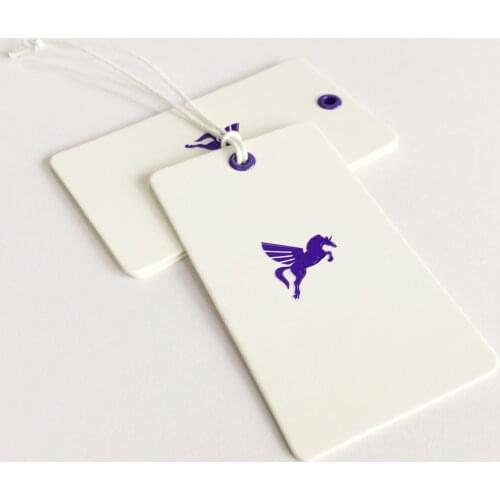 Very Cheaper High Quality Custom Garment White Art Paper Debossed Logo With Purple Eyelet For Clothing