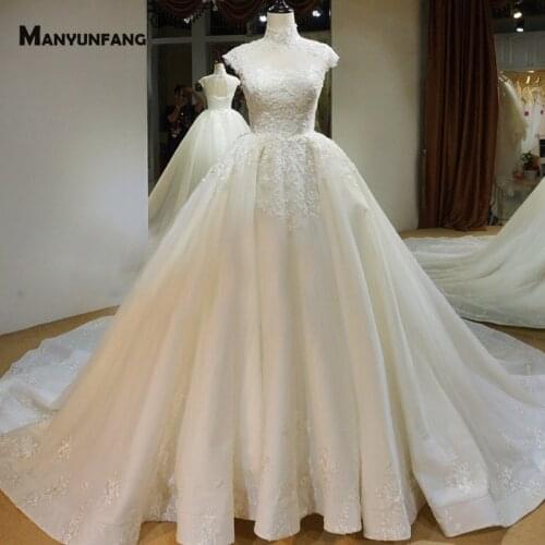 High-End Embroidery Appliques Tulle Chapel Train Bridal Ball Gown 2021 New Arrival Cap Sleeve Lace Up Back Wedding Dress