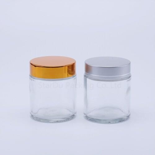 100pcs 80g clear Glass Cream Jars Cosmetic Packaging with lid plastic caps & inner liners round empty small glass jars