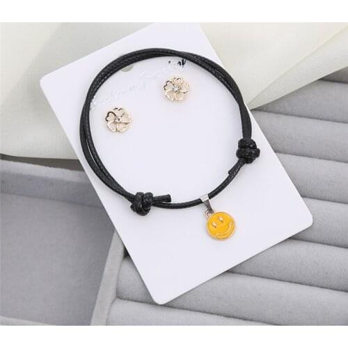 HTZZY New Fashion Earrings and Bracelets Jewelry Set for Women Crystal Flowers Stud Earrings Cute Smiling Face Bracelet