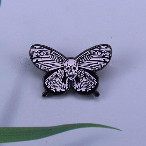 Death moth enamel pin using sugar skull pattern style Looks classy and cool