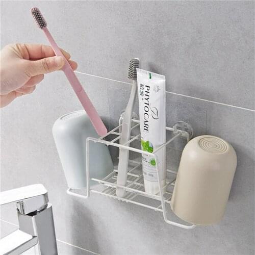 2020 New Wall Suction Toothbrush Holder Iron Art Hollow-carved Design Ventilate Drain Bathroom Cup Inverted Storage Tools