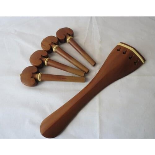 A set of high-grade 4/4 cello jujube wood accessories, piano shaft/string button, string drawing board