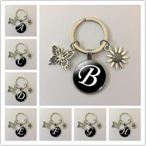 New A-Z letter butterfly keychain flower keychain glass cabochon female fashion jewelry high quality car decoration keychain