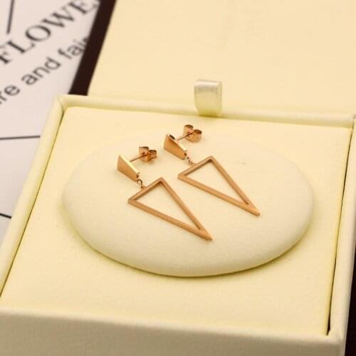 Trapezoid hanging hollow triangle drop earrings conform female fashion titanium steel rose gold earrings jewelry