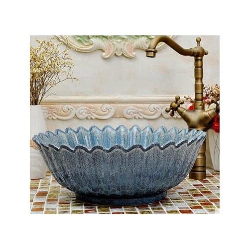 Ou.. Artistic basin, basin. The sink. The stage basin. - small petals