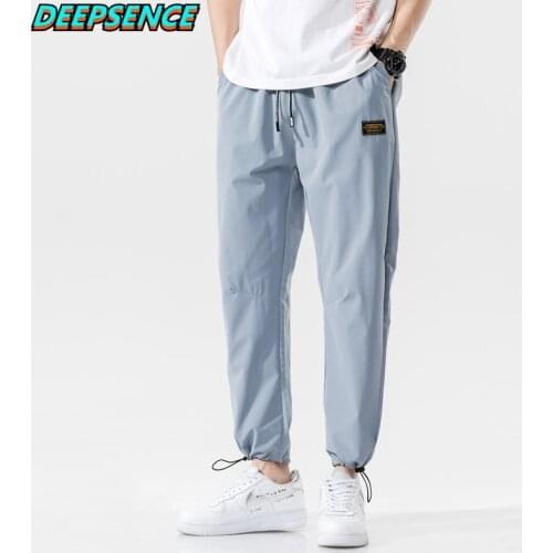 Men Spring And Autumn New Polyester Casual Pencil Pants Men Drawstring Youthful Vitality Loose Fit Ankle Length Pants Men