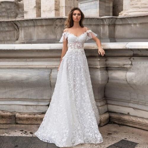 Backless Wedding Dresses A-line Spaghetti Straps Tulle Lace Boho Dubai Arabic Wedding Gown Bridal Dress Vestido De Noiva