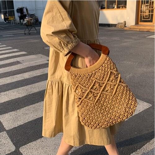 Casual hollow wooden handle women handbags rope woven fishnet straw bags summer beach large capacity tote female big purses 2021