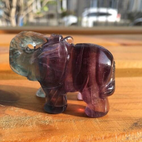 Cute hand-carved natural fluorite baby elephants as gifts and home decor