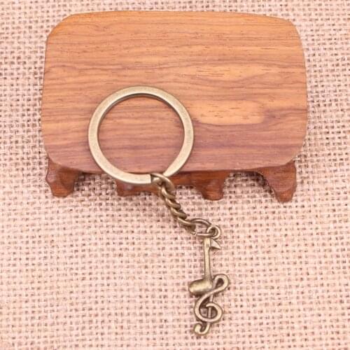 20pcs New Fashion Keychain 31x11mm musical note Pendants DIY Men Jewelry Car Key Chain Ring Holder Souvenir For Gift