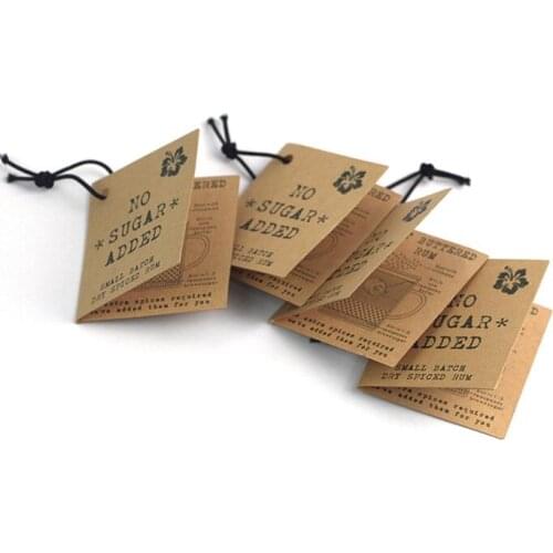 Customized garment tags with string branded folded swing tags
