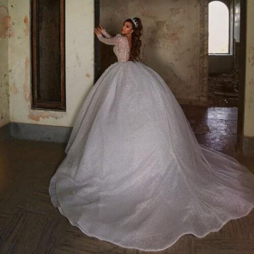 Luxury Full Pearls Dubai Wedding Dress 2021 Newest Long Sleeves V-neck Bridal Ball Gowns With Long Train White Wedding Gowns