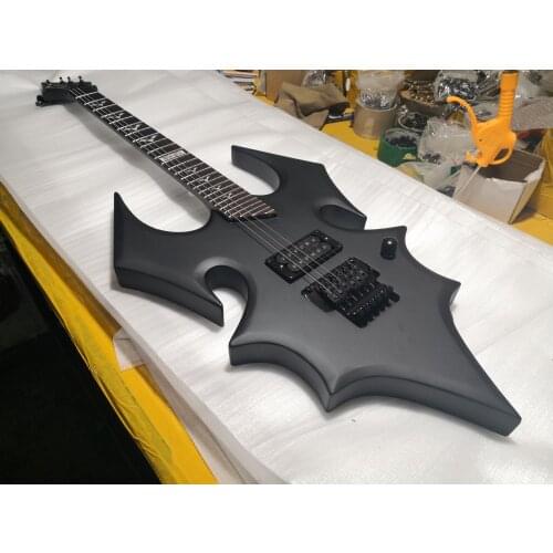 Free shipping custom 6 string guitar,irregular guitar,matte black basswood body ,maple neck,tremolo,H pickup,black hardware