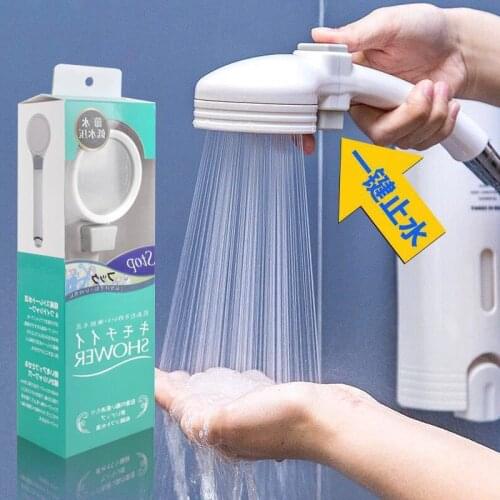 Japanese flower is aspersed a key water pressurization handheld shower water heater in the rain check water shower head