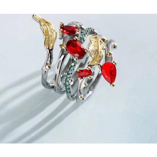 Black and gold two-tone feather leaf inlaid purple zirconium creative ring