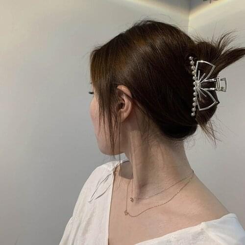 Net celebrity metal bow pearl back of the head medium grasping clip South Korea ins simple hairpin side clip hair accessories
