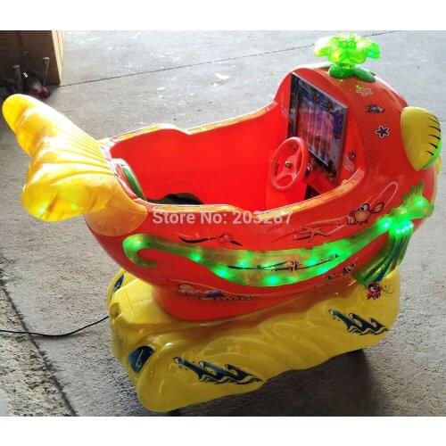 Coin operated kiddie rides, rocking machine, whale