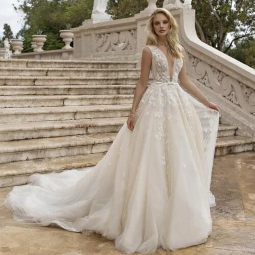 Gorgeous Wedding Dress 2021 Sexy Deep V-Neck Lace Appliques Beads Backless Sweep Train A-Line Bridal Gown Vestidos De Noiva