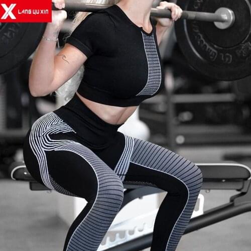 New Hollow Sexy Fashion Sports Short Sleeve 2Pcs Yoga Tracksuits High Waist Leggings Peach Hip Fitness Suit For Women