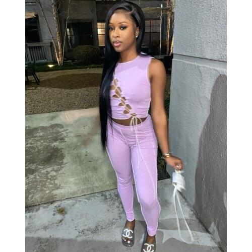 Sexy fashionable womens clothing in summer, solid color striped round neck sleeveless T-shirt with two-piece hollow tie