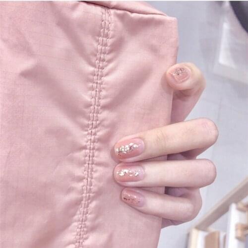 Summer pinklish orange pure color with gold foil decorated fake nails Japanese short lady full nail tips cute false nails