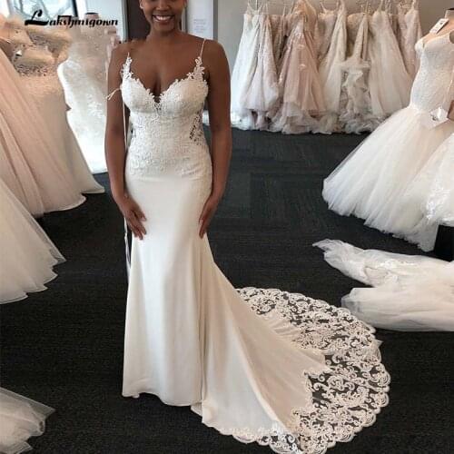 2020 Mermaid Wedding Dresses African Spaghetti Criss Cross Back Bridal Gowns Lace Appliques Sweep Train Wedding Dress