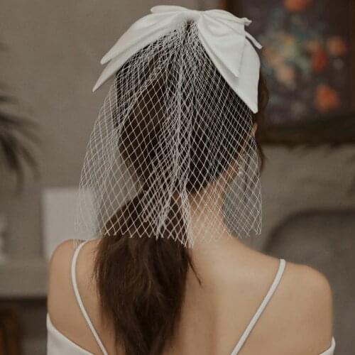 The new hat yarn bridal wedding headdress veil has a hairpin satin net yarn Sen-line travel photo studio