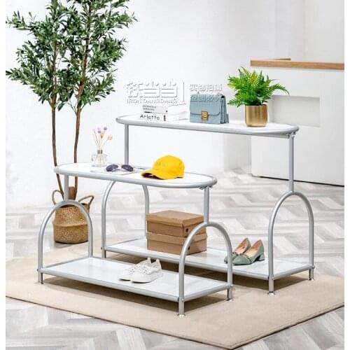Exhibition stand clothing store high and low circular flow table womens clothing shop creative floor type silver stand shelf