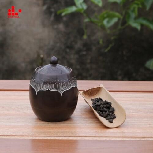 Boerna Nixing Pottery tea storage with 100g capacity lotus seed pattern is a perfect gift carved by hand te matcha lata oolong