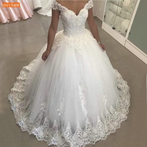 Graceful African White Wedding Dresses Off Shoulder Appliqued Lace Tulle Ball Gown Bridal Dress Long 2020 Arabian Wedding Gowns