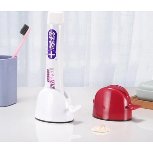Rolling Tube Toothpaste Squeezer Dispenser for Bathroom Accessories Tooth Paste Squeezer Dispenser Creative Toothpaste Holder