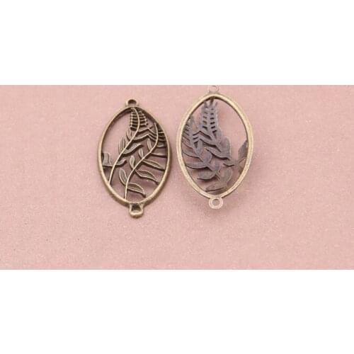 100pcs Vintage Hollow Leaves Double Hanging Charms Jewelry For Making Necklace/Bracelet/Key Chain Fashion DIY Jewelry Accessorie