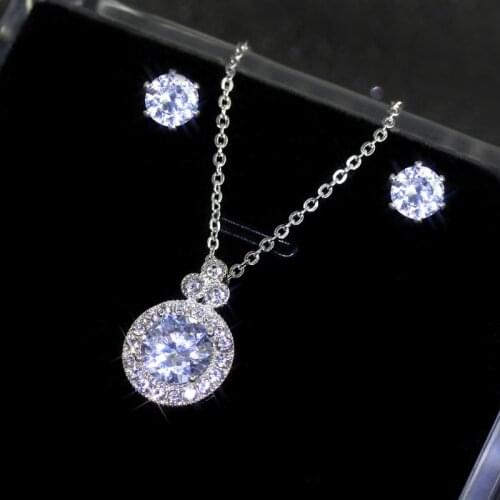 Popular hip-hop Cross Temperament Ice Snow Flower Romantic Round Cubic Zircom Star Disc Necklace Earring Set Alloy