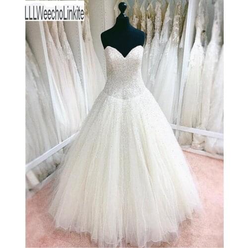 Ivory Lace Tulle Beading Sweetheart A-Line Princess Wedding Dresses Chapel Train Strapless Sleeveless Custom Made