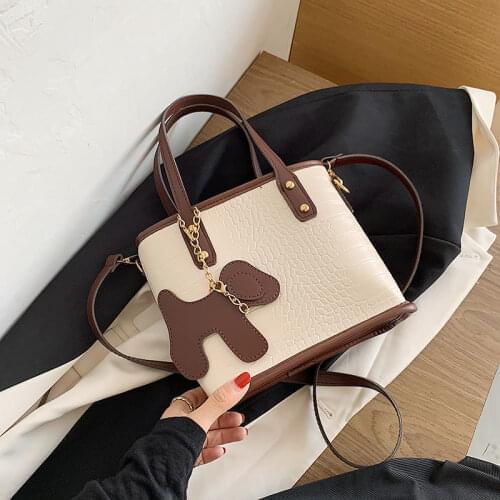 Womens Shoulder Bag Bucket Stone Texture Cute Dog Pendant Leather Crossbody Handbags Wholesale 2022 New Fashion Female Bags