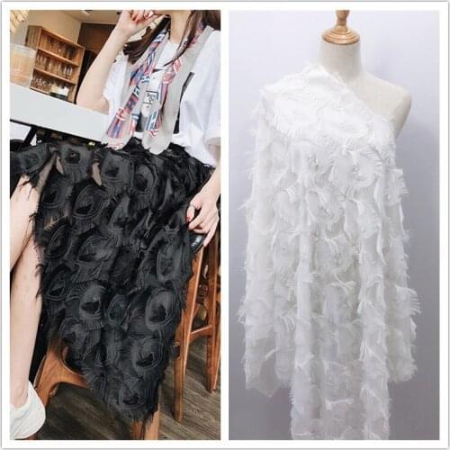Open screen fashion tassel jacquard + flower cutting Chiffon eye fabric feather cutting tassel clothing fabric fashion