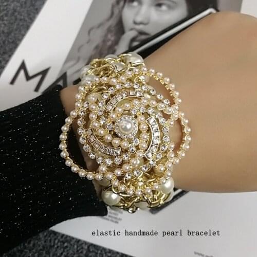 Luxury handmade elastic pearl crystal camellia flower bracelet bangle jewelry for women