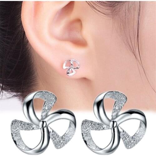 1 Pair Womens Classic Elegant Rotating Lucky Clover Flowers Shape Ear Stud Earrings Fashion Jewelry Gifts E0050