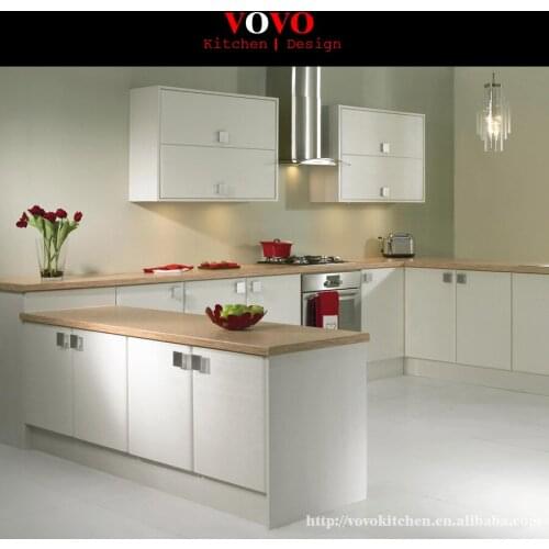 U shaped white kitchen furniture with solid wood bench top