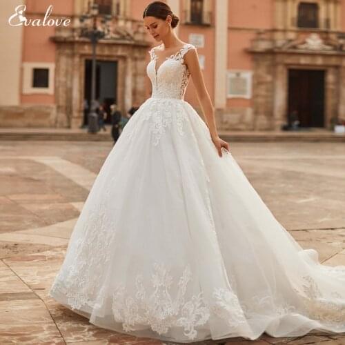 EVALOVE Glamorous Cap Sleeve Appliques Customized A-Line Wedding Dress Luxury Beading Scoop Neck Backless Princess Bridal Gown