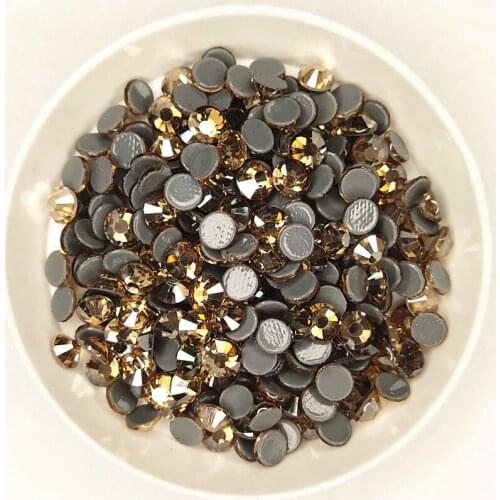 Top Quality Gold Champagne Hot fix Rhinestones Super glitter Glass Strass Iron On stones For Fabric garment/Clothes DIY
