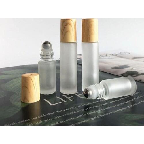 100pcs 5ml 10ml Essential Oil Frosted Clear Glass Roll On Bottle with Wood Grain Plastic Cap Metal Roller Ball free shipping
